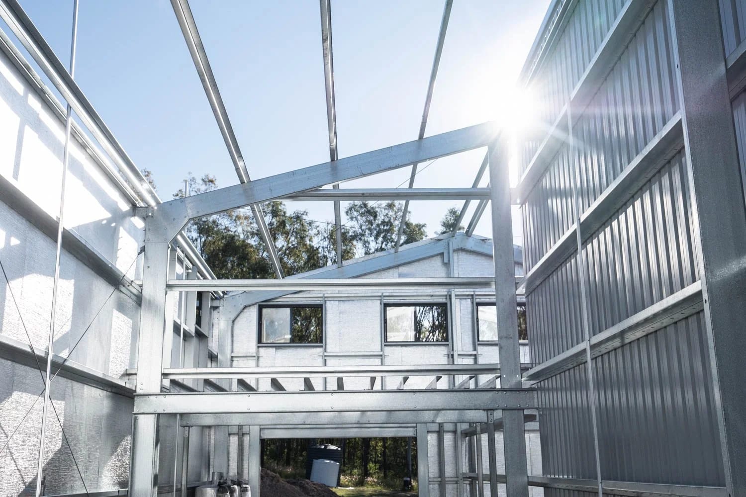 DIY shed kit during construction showing steel frame and COLORBOND cladding