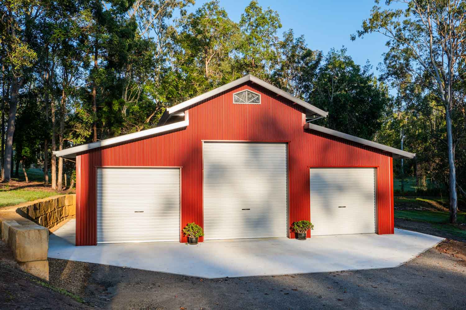 three roller doors on american barn