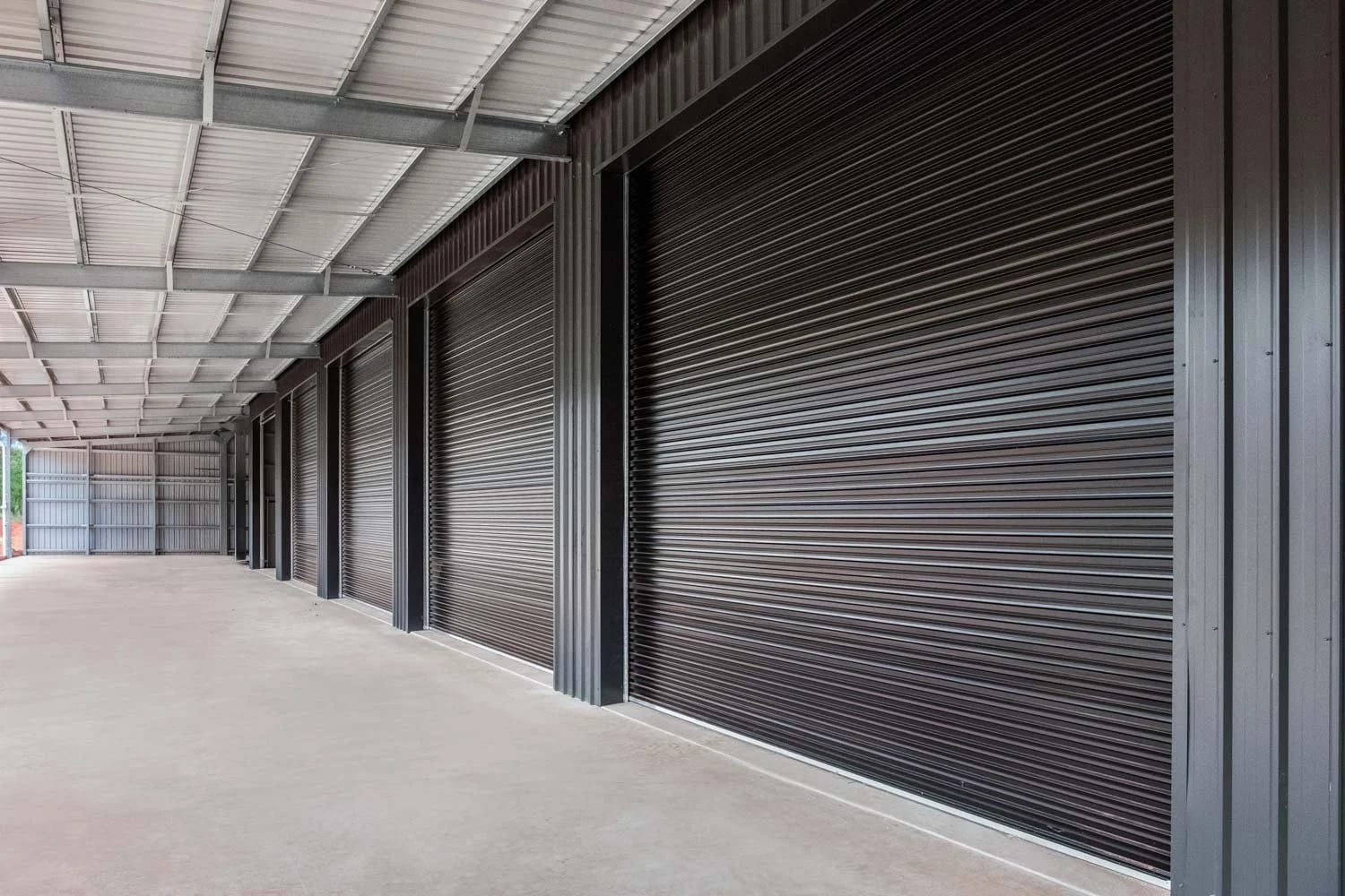 Multiple Rollers and a PA Door for Easy Access — A Big Cabarlah Shed Built to Work