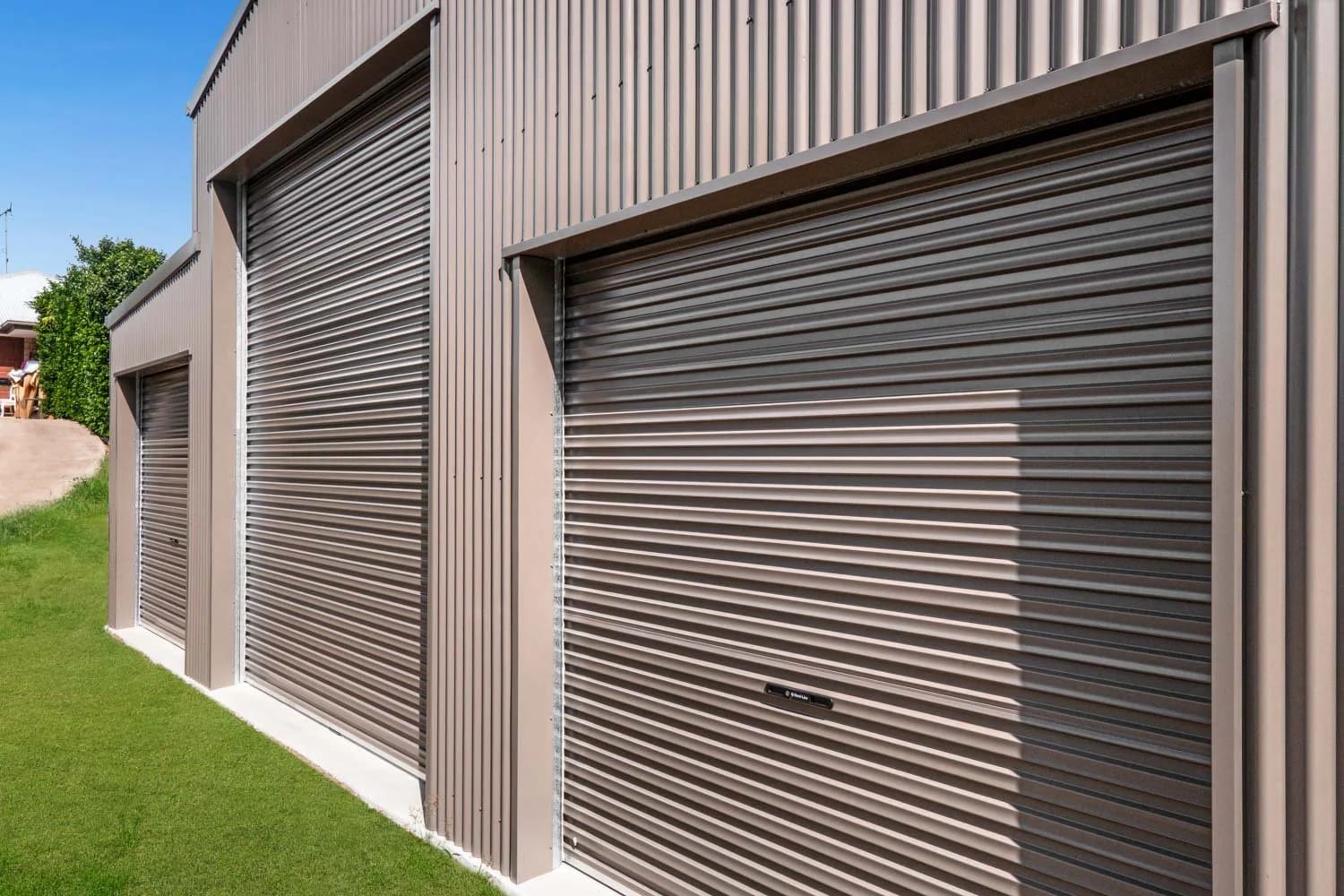 Three Steel-Line Roller Doors — Custom Fernvale Shed
