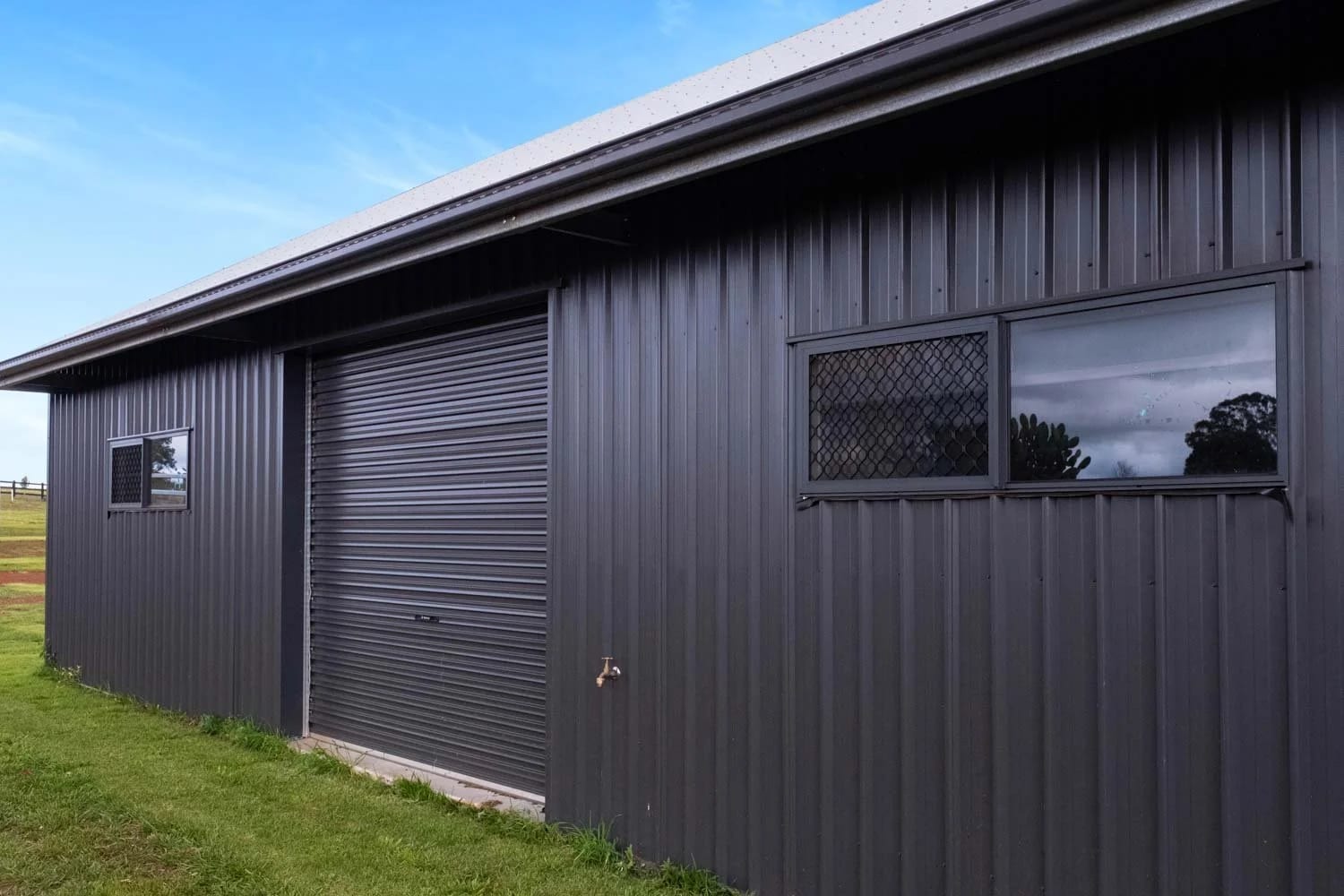 shed with multiple roller doors