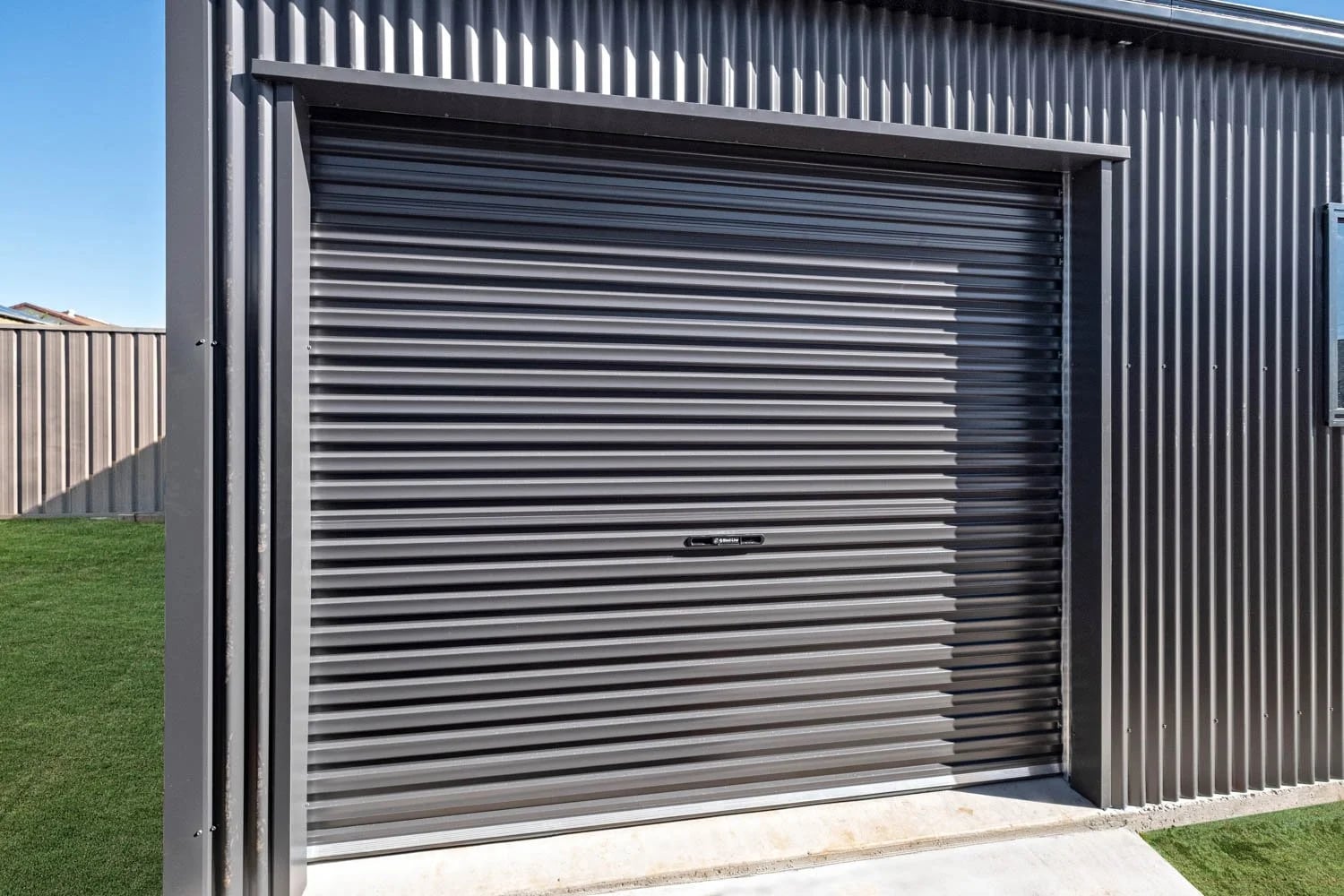 Steel-Line Roller Door — Tidy Kearneys Spring Residential Shed