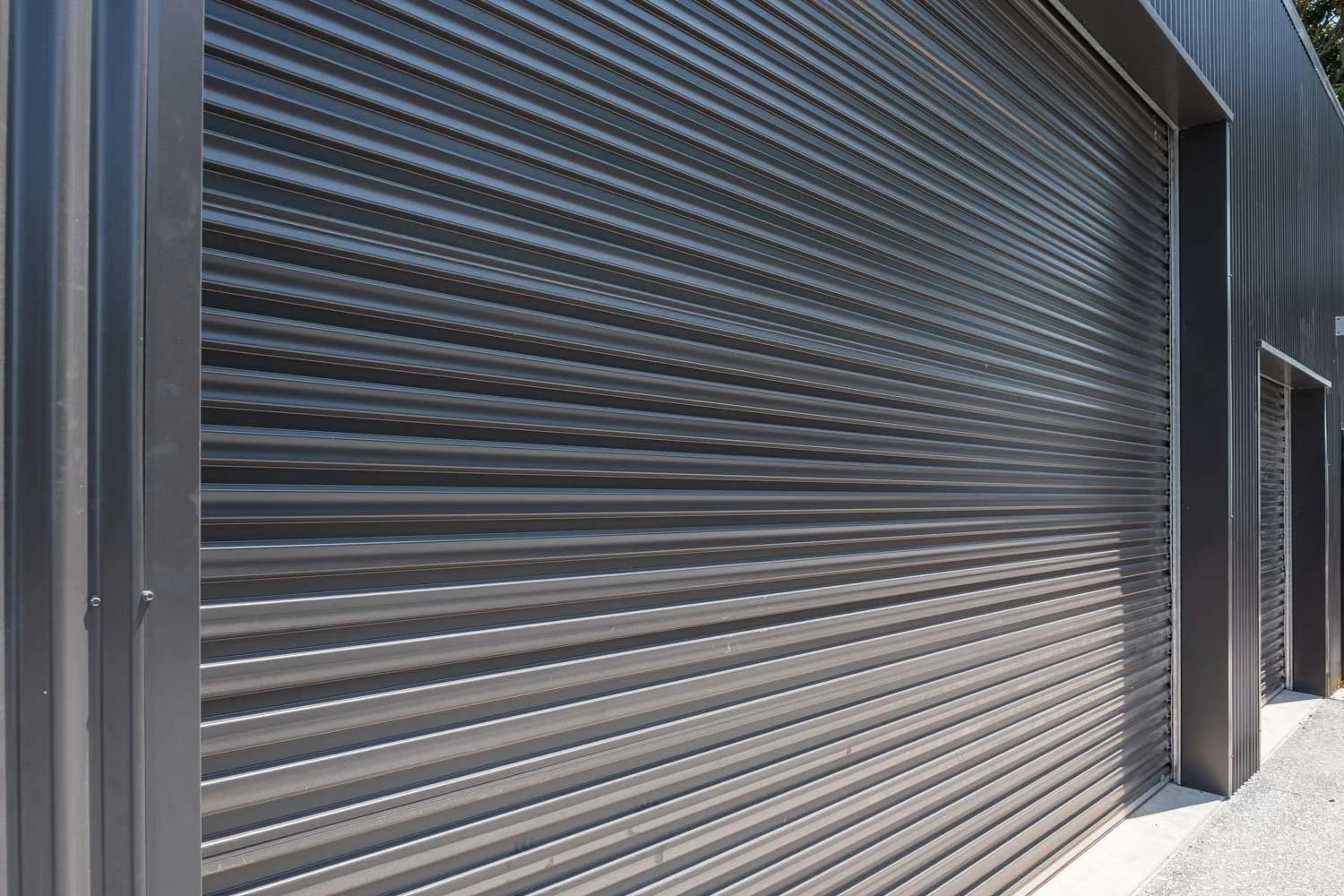 Colorbond® Monument Roof and Cladding — Skillion Shed with Multiple Entries
