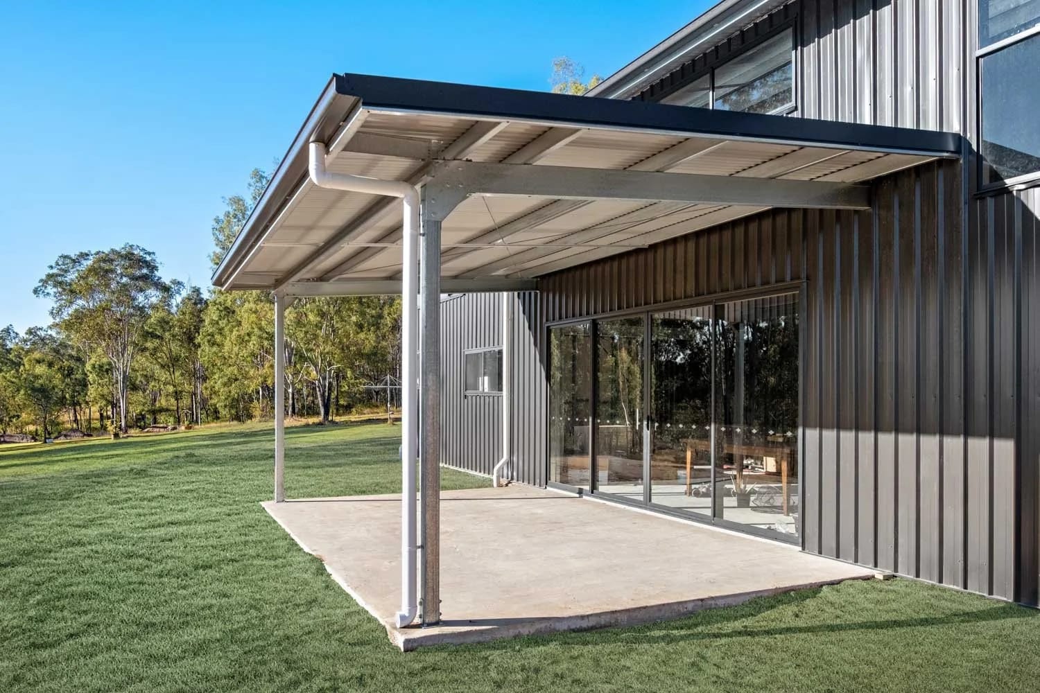 Verandah Awning with Sliding Glass Door Access — What Makes This Withcott Shed Stand Out?