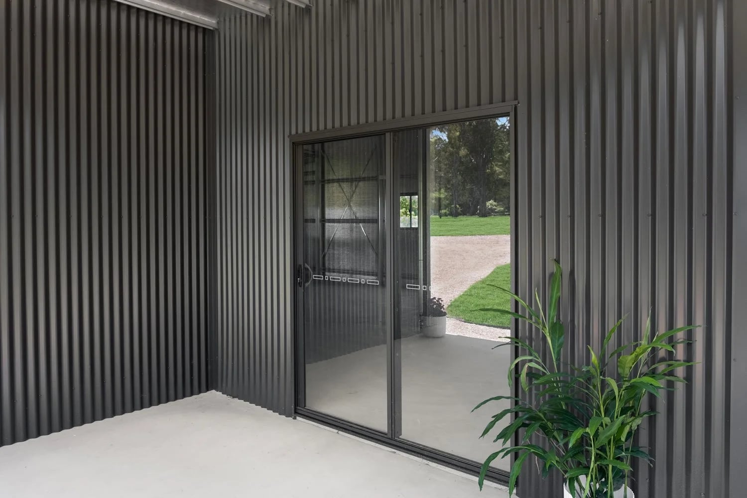 Sliding Glass Door from the Verandah — Stunning Rural Shed in Adare