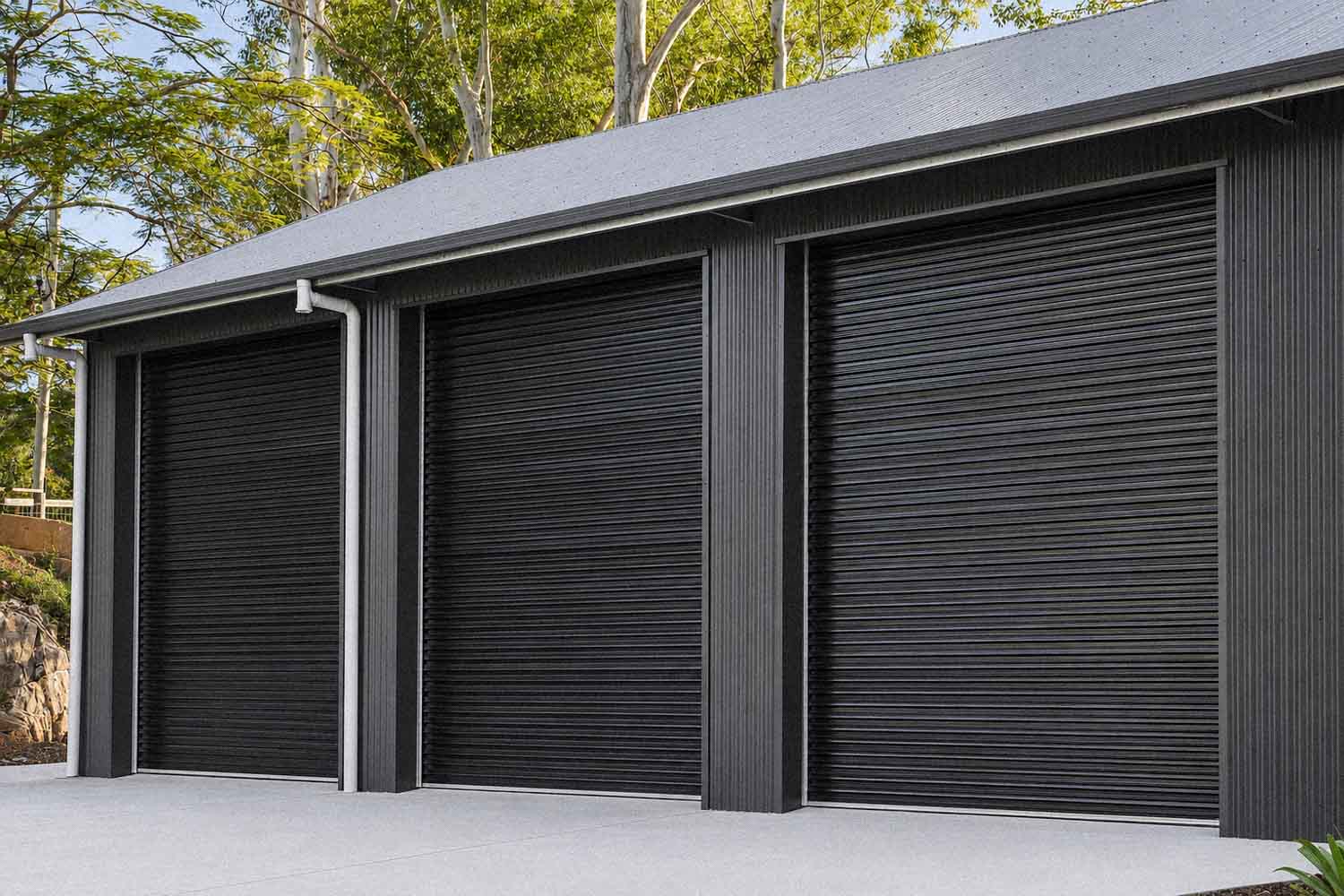 triple roller doors from Steel-Line on a shed