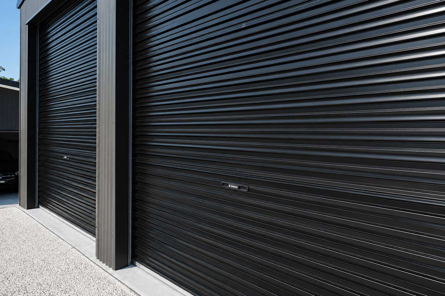 delaneys creek shed with 3 roller doors