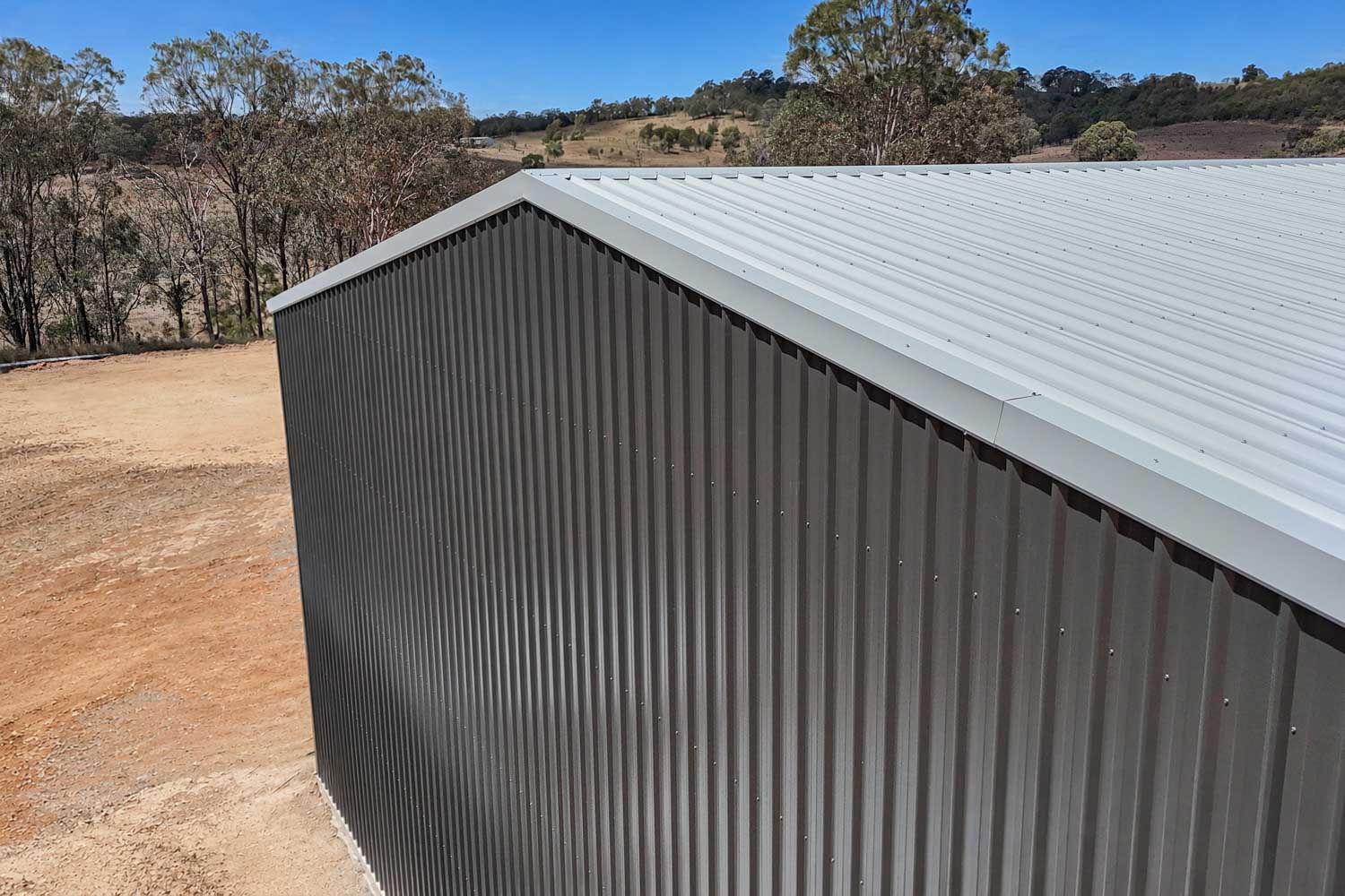 shed with monument walls and shale grey roof