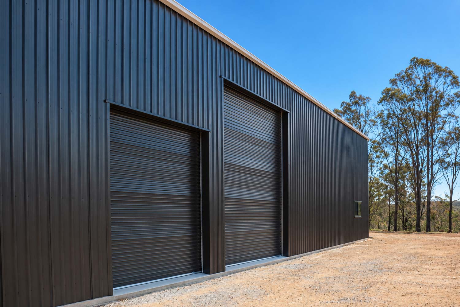 five roller doors on a shed