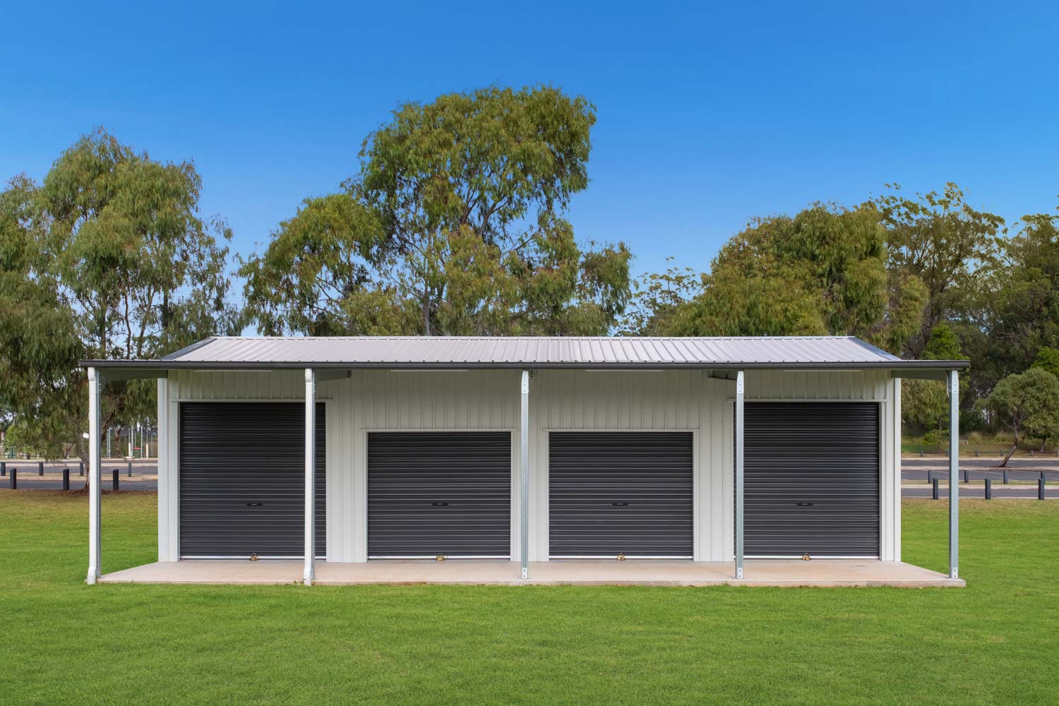 four roller doors on shed
