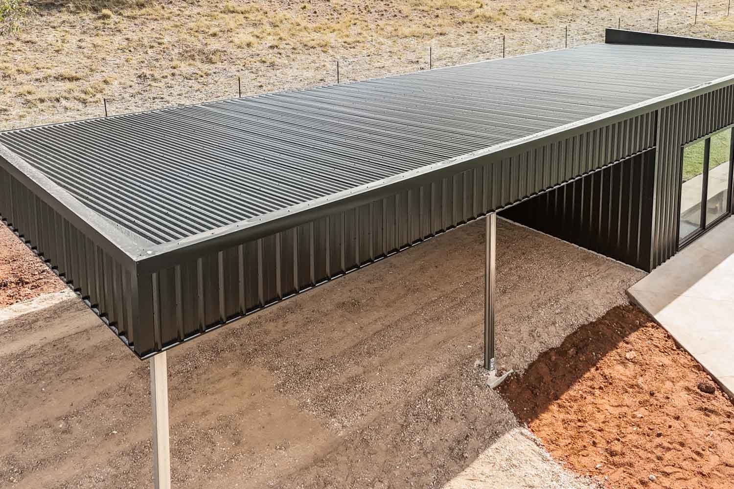 black skillion roof shed on farm