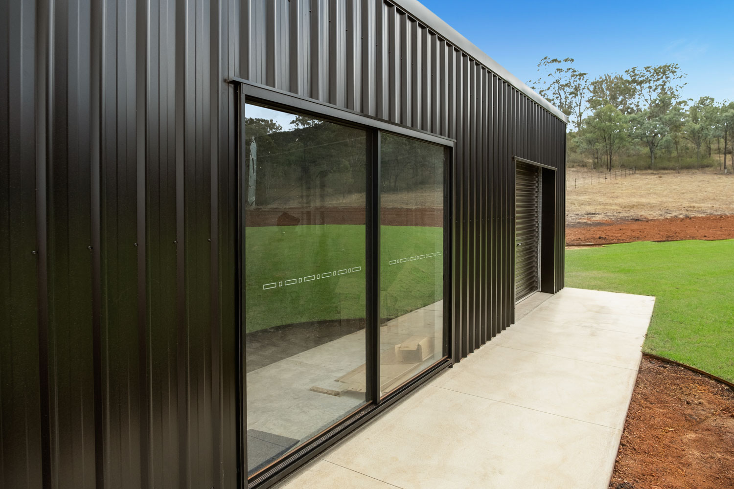 Bradnams glass sliding door on shed