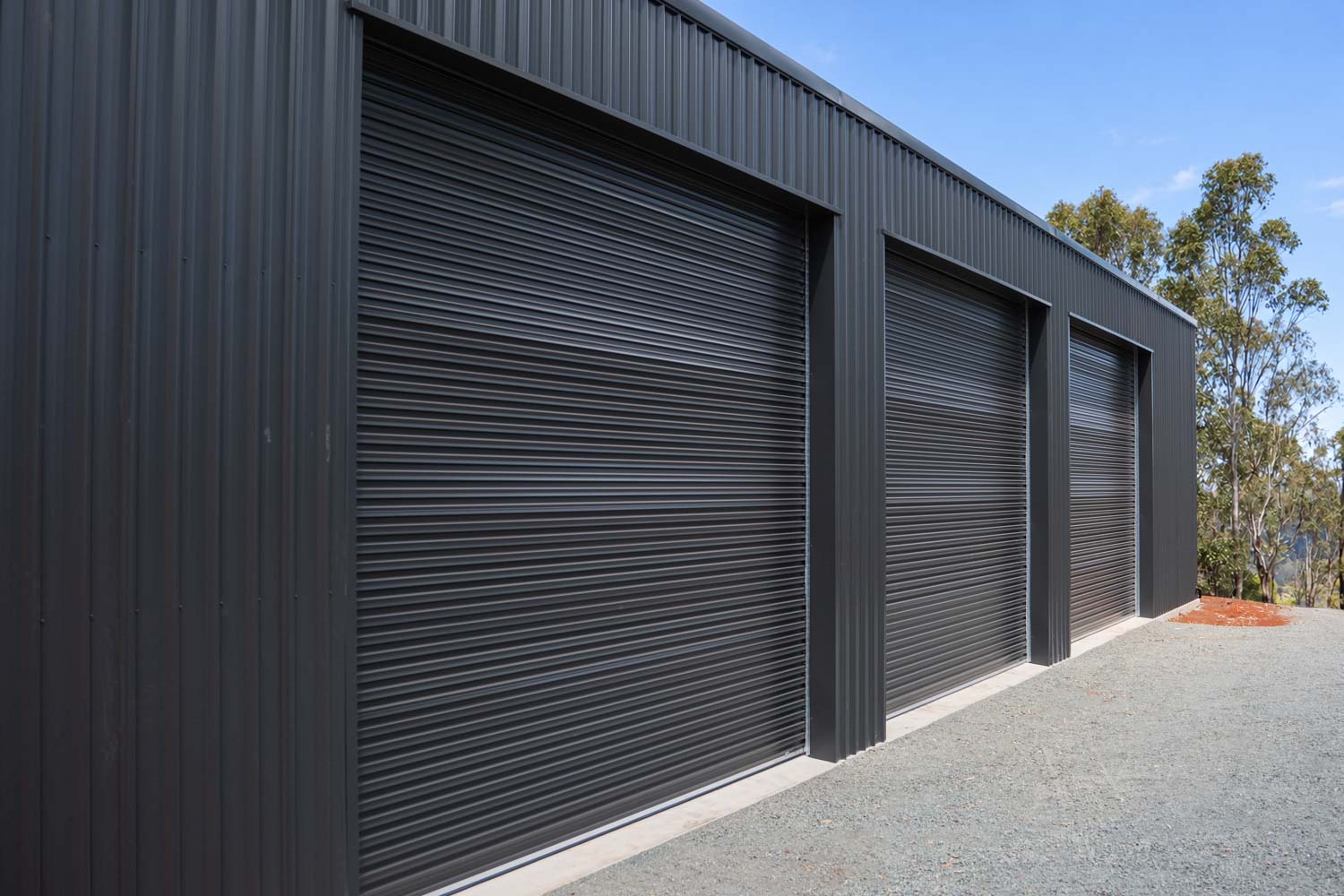 shed with multiple roller doors
