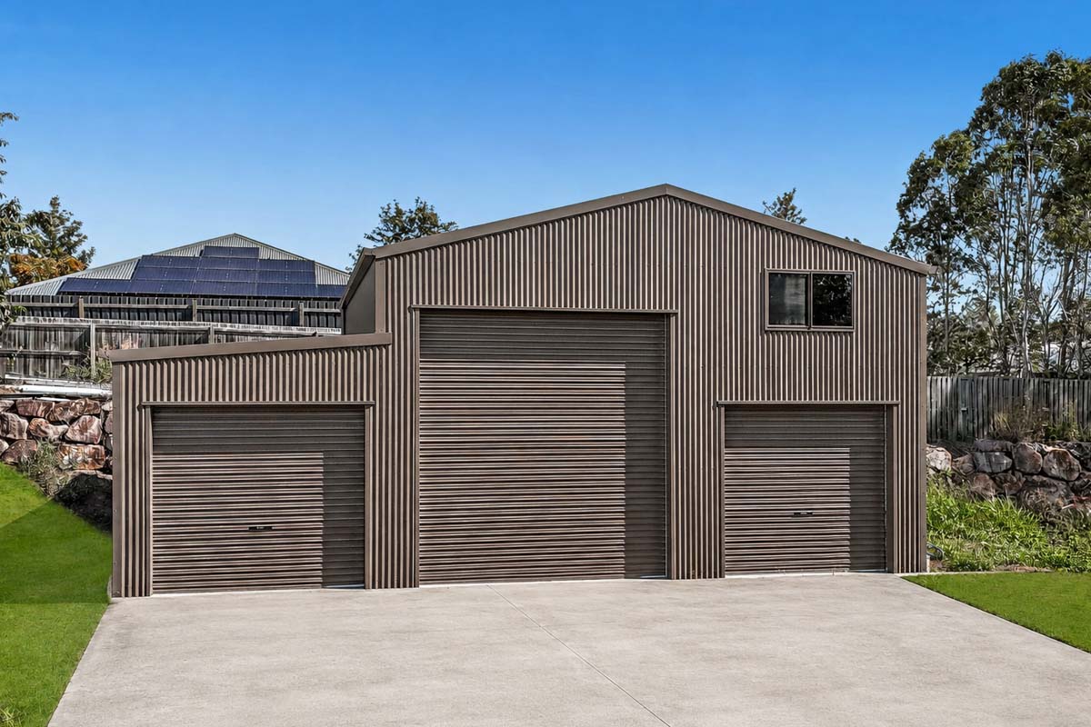 A residential shed with concrete driveway